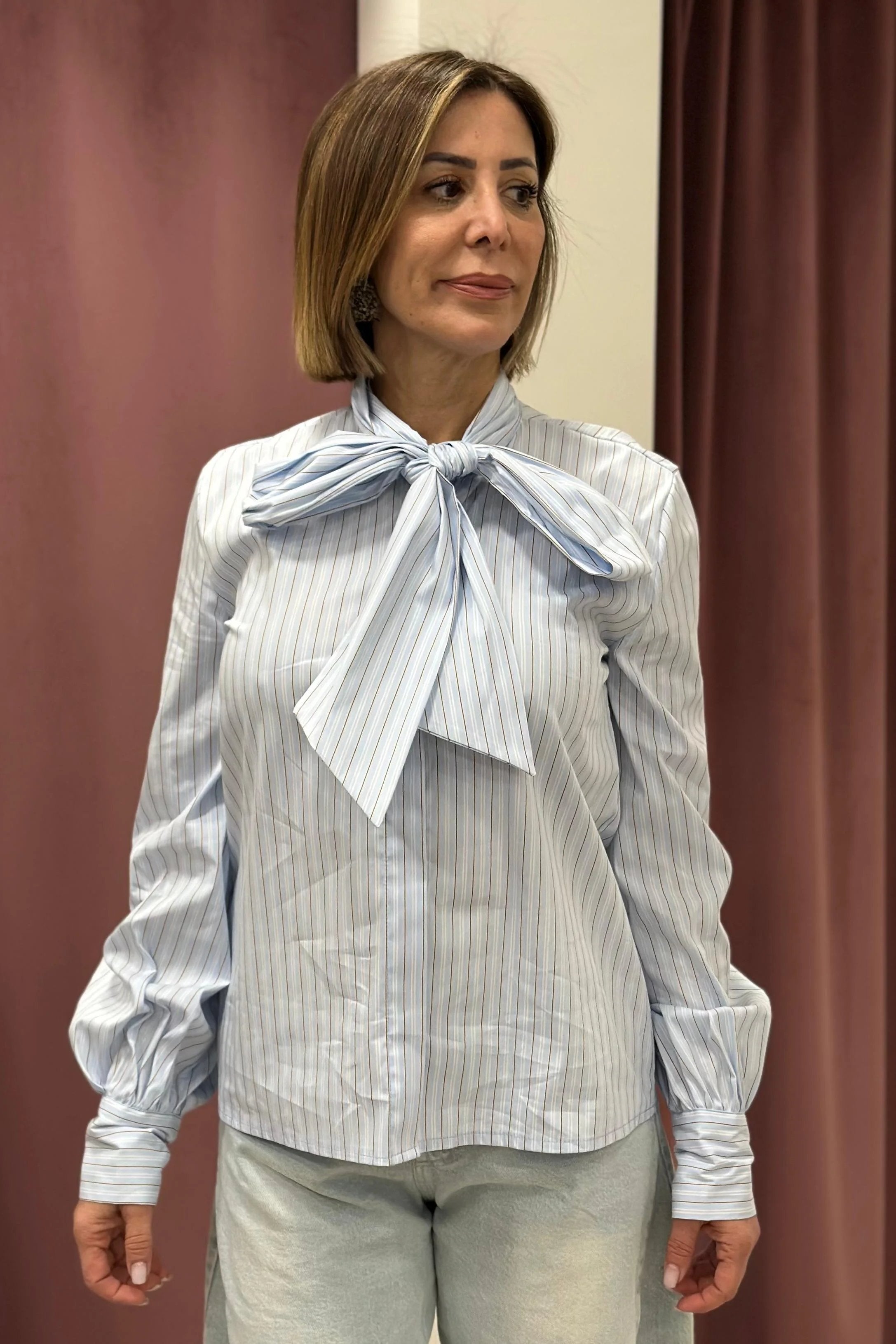 CAMICIA CON FIOCCO CELESTE