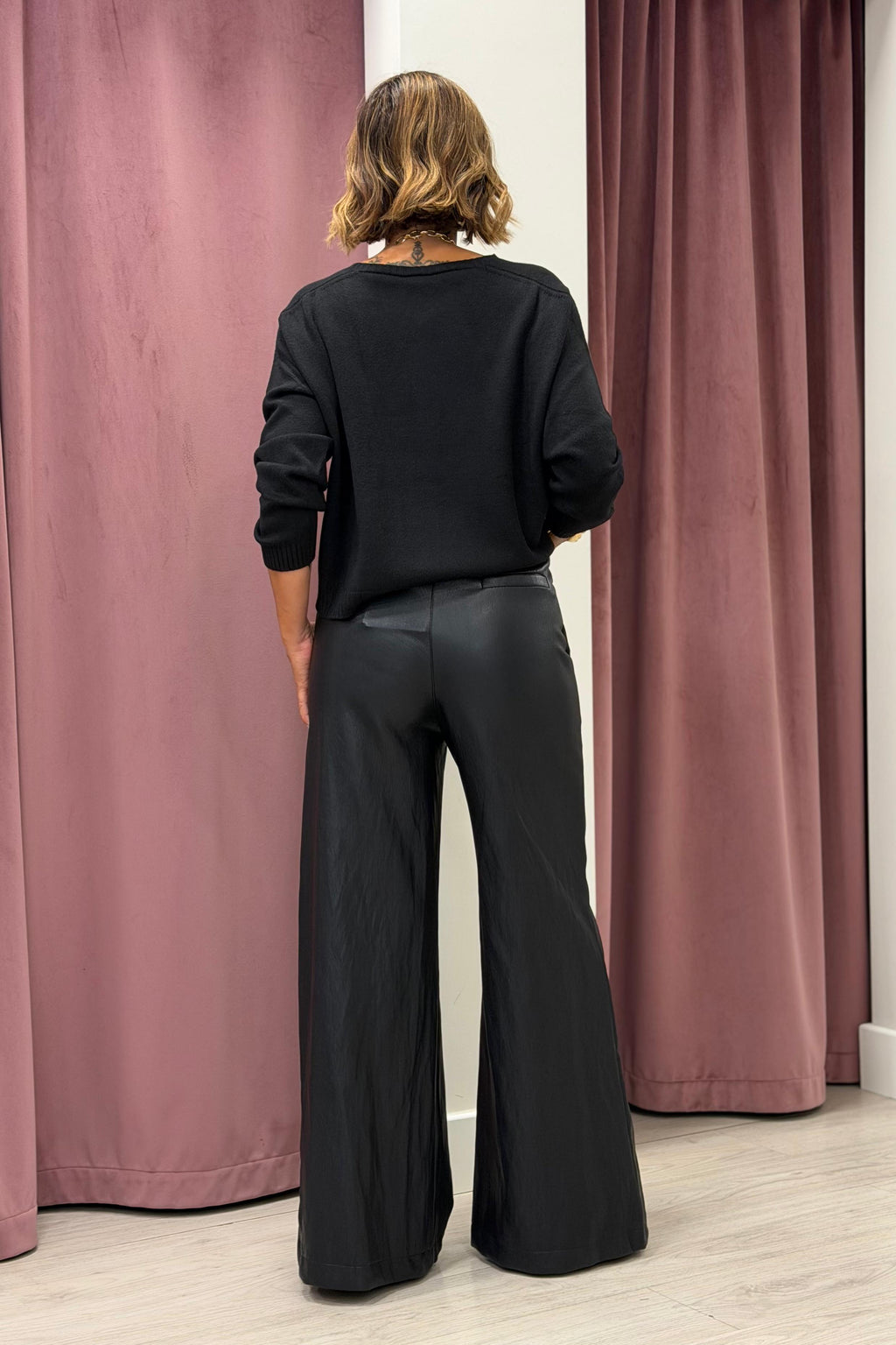 PANTALONE IN ECOPELLE A ZAMPA NERO TENSIONE IN