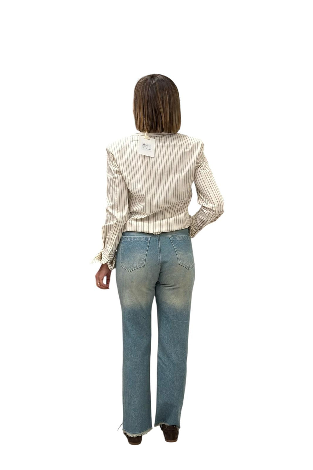 JEANS TENSIONE IN DRITTO SFRANGIATO SUL FONDO